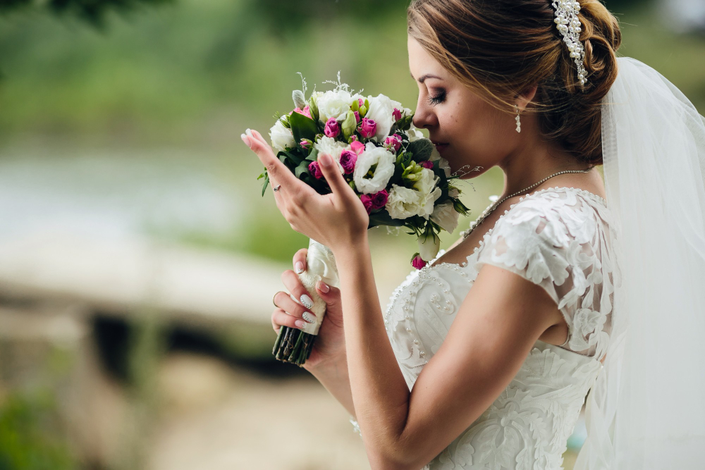 pretty-bride-smelling-flowers (1)